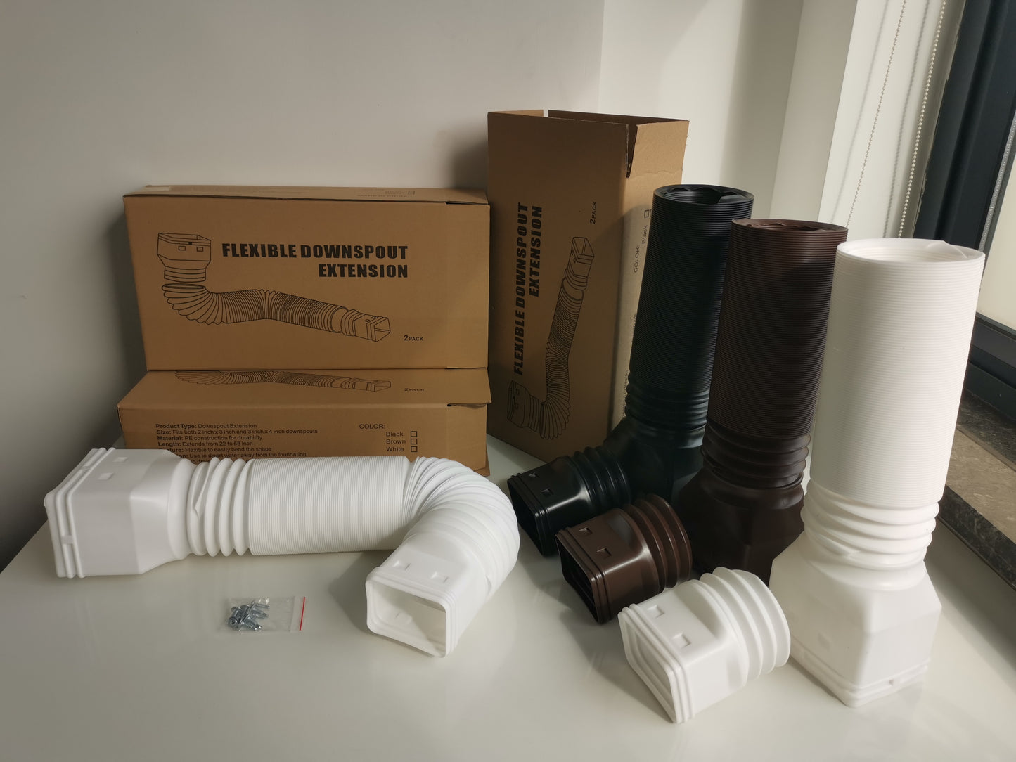 2pcs pack Flexible downspout extensions, white, brown & black.